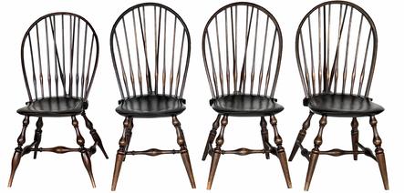 H447 Set of 4 Wallace Nutting Braceback Windsor chairs. Three retain the stamp 301 with partial paper labels, and one retains the stamp 303 with full paper label and WALLACE NUTTING stamp below the label. Each chair retains its original light brown finish.  In the early 20th Century Wallace Nutting (1861-1941) 