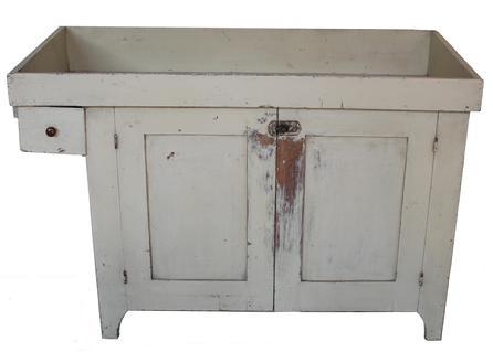 C436 19th century York Pennsylvania over hanging drawer Drysink, in the dry original oyster white paint, high cut out foot, retains the old natural patina on the interior. one board well, with tapered sided. one board bottom, the drawers is square head nailed. circ 1860
