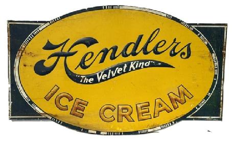 M1101 Super metal Trade Sign advertising �Hendlers Ice Cream - The Velvet Kind�. Sign is in great condition with original blue, yellow, white and gold painted surface and remnants of sign maker�s mark remains in lower right corner �M�.5711�. Hendlers was manufactured in Baltimore, Maryland - started in 1905 � and grew into one of the most famous and iconic brands, being sold in over 400 stores throughout the state at the Company�s peak. The Borden Company purchased the company in 1929, yet it continued to operate under the Hendlers Creamery name until the late 1960s. Measurements: 51 &frac34;� wide x 31 &frac12;� tall. 