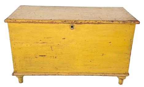 L15 Identified mid-19th century Pennsylvania vibrant yellow painted pine blanket chest bearing family history inside lid. Six-board dovetailed construction with lidded til inside, resting on applied turned feet. Rounded edged molding surrounds the lid and bottom of the chest. Pencil writing inside the lid reads:  Sarah Shank is the owners name of this chest ** Grand Rebecca Hoy **Dont steal this chest my finest friend  ** for fearing the gallows will be your end ** Ritten by a friend ** Anna R Hoy  Off to the side is written:  1855 Earliest known record of this chest  Sarah Shank 1855-1901; Anna R Hoy 1901-1928; Elsie Feister  1928-1938; Luther Boyer 1938-. Clean, natural patina interior. Measurements: 37 ½ wide x 18 deep x 22 ½ tall.   