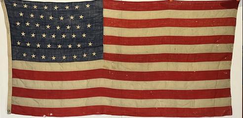 RM1445 Rare Civil War Veterans 46 Star American flag (1908-1912) with identification inscribed on the hoist edge �M.P. Resch GAR� � which research shows is Michael Resch of the 9th Wisconsin � who enlisted on 9/10/1861 as a Private, mustered into �C� Co. WI 9th Infantry on 9/10/1861,