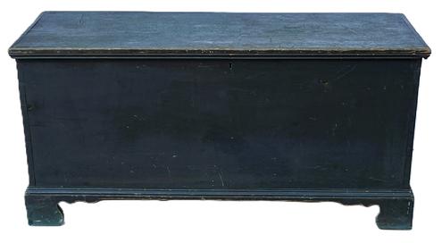 **SOLD** K1518 Early 19th century Eastern Shore, Maryland blanket chest in original dry blue paint. Six board dovetailed construction with applied dovetailed bracket base featuring nice cut outs, applied molding around three sides of the lid secured by small square head nails. Lidded glove till with molded edge mortised inside. Clean, natural patina interior. Original key. Circa 1820s-1840s. Measurements: 25 wide x 13 deep x 15 3/4 tall  