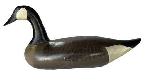 K231 Canada Goose Decoy carved by R. Madison Mitchell (1901-1993) of Havre De Grace, MD in original paint.  Approximate measurements:  24 long x 8 ½ wide x 11 ¼ tall. 