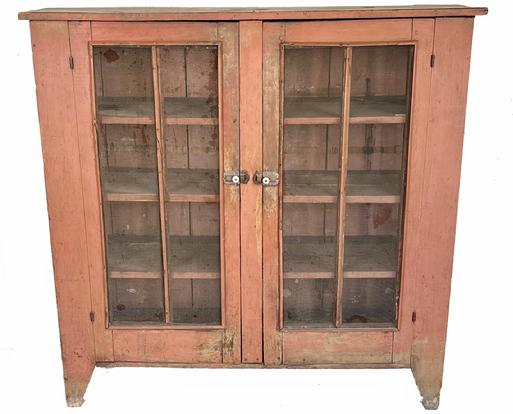 KW2 19th century Food Safe with the original beautiful salmon paint from East Berlin Pennsylvania featuring nice high cut out feet. Measurements: 17 1/4" x deep x 52" wide x 50 1/4" tall  