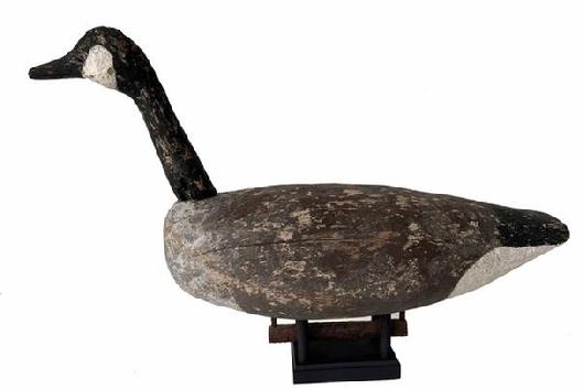 H205 Very rare root head goose decoy, by Otis Bridges of Talbot County Maryland retains its original weight. Otis owned a General Store and was a fishing guide in Talbot County.