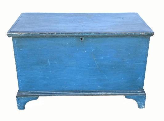 E206 EARLY 19TH CENTURY BLUE PAINTED PINE PENNSYLVANIA BLANKET CHEST, This is a wonderful early 19th Century painted blanket chest from South eastern Pennsylvania, with ORIGINAL blue paint. The surface undisturbed, the exterior of the case crafted of six broad planks of Eastern White Pine, the sides and bottom joined with exposed dovetail construction.