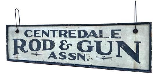 H419 Exceptional 19th century Rhode Island double sided sign advertising "Centredale Rod & Gun Assn." Untouched dry surface with original black painted letters on a white background with a 2 1/4" wide black painted applied molding encasing the entire sign. Extremely well preserved with very slightly weathered surface and minor crackling to paint. Retains early metal wire hangers, as well as several holes for optional ways of hanging / displaying. "Centredale" (also spelled "Centerdale") is a village within the town of North Providence, Rhode Island. Documentation indicates the Centredale Rod & Gun Assn. was host to many trap shoots in the Summer of 1898 that