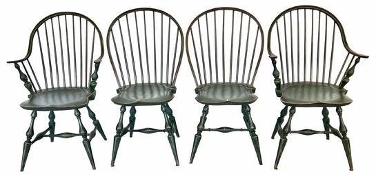 G918 Set of four New England bench made painted Windsor Chairs, built with a solid wooden seat . The seats of Windsor chairs are carved into a shallow dish or saddle shape for comfort. ,. The back of the Chairs is steam bent pieces of wood. - two arm Chairs and two bow back, with a Windsor green paint with mustard pin stripping Image Properties