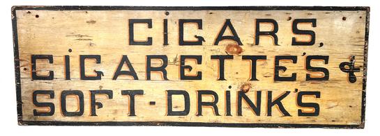 H240 Late 19th century Double sided wooden painted trade / advertising sign. This Sign was used  for two different business, One side reads: : �Cigars Cigarettes + Soft-Drink�s� painted in black lettering with orange painted highlighting. A black painted border outlines this side of the sign The reverse side reads: �Feed For Sale Here� - painted in white lettering on a black background. This side shows signs of exposure to the elements over a period of many years. �Feed For Sale Here� - painted in white lettering on a black background. This side shows signs of exposure to the elements over a period of many years Measurements: 41 ¼� wide x 14 ½� tall x ¾� thick