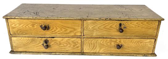 J330 19th century Pennsylvania original mustard grain painted set of 4 drawers that were used on a Country store counter for selling merchandise. Small square head nail construction with varied internal drawer dividers that allow for a multitude of versatile storage options. Circa 1840-1850�s. Measurements: 33� wide x 11 ½� deep x 8 ¾� tall