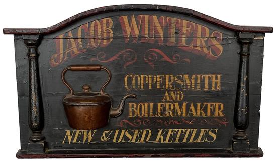 K222 Trade Sign advertising Jacob Winters - Coppersmith and Boilermaker  New & Used Kettles hand painted in mustard letters with red shadowing /accents on a black painted background. The sign boasts half of a copper kettle applied in the center with applied shaped molding along the top edge and applied decorative wooden pillars on each side of the lettering. This mid-20th century Trade Sign was made to look like those of the early 1900s. Very sturdy and heavy. Measurements:  35 ¾ wide x 2 ¼ deep x 21 ½ tall. The copper kettle is 3 ¼ deep. 