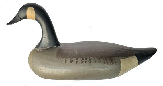 J239 Rare full size Goose decoy carved by Joseph Evans McKinney (1913-2000) Elkton Maryland. Original paint, double weighted. McKinney didnt make many Geese. Circa 1950.