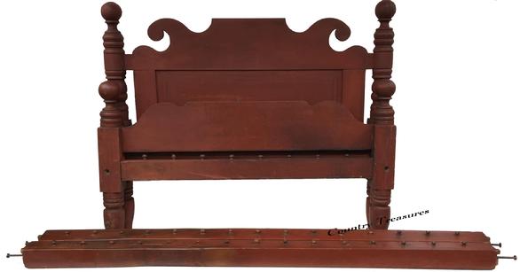 X158 19th century Lancaster Pennsylvania rope bed with the original red paint  (circa 1825-40),. Four deeply turned  posts having elongated acorn finials and turnip feet; original rails retaining the rope pegs (never converted); hand-forged steel bolts