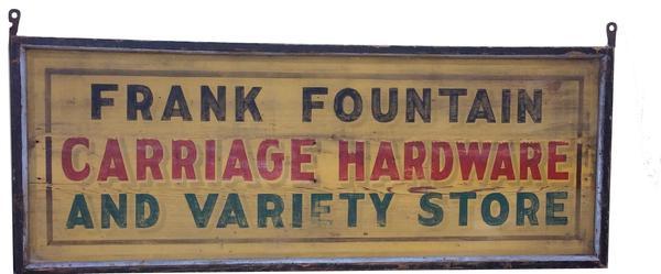 C520 Late 19th century Trade Sign from upstate New York, Frank Fountain Carriages and Hardware , painted on board, with applied molding, great colors of yellow back ground with black, red and green, lettering Measurements are: 24" tall and 62" long