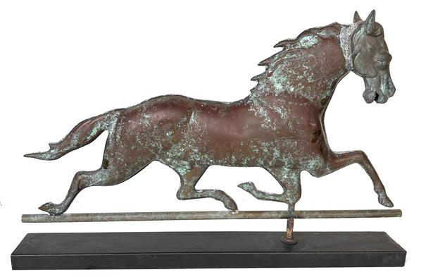 H120 Large swell body copper running horse weathervane with cast head. Mounted on a base for display purposes. 20th c., Measurements on stand: 33 1/2" long x 4" wide x 21 1/4" tall