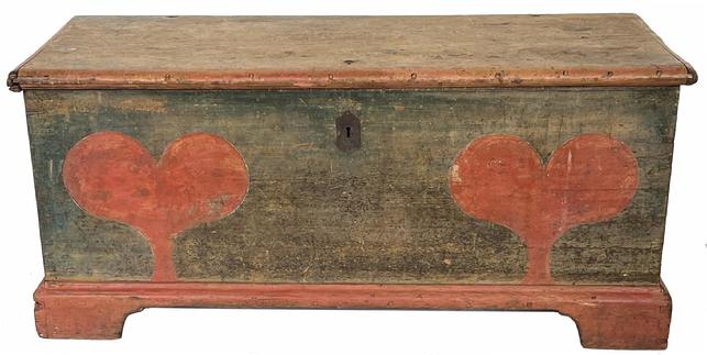 **SOLD** H456 Exquisite 18th century Lancaster County, Pennsylvania painted Dowers Chest in   original blue painted surface with red heart decorations. Six board construction with case and original applied bracket base being fully dovetailed front and back. The lid is mortised through the applied molded edges and secured with wooden pins.  Retains original blacksmith made hand forged strap hinges, lock and hasp. Lidded glove til inside is adorned with molded edges on top and bottom. Circa 1750 � 1770. Measurements: 47 ¾� wide x 21 ¼� deep x 21 ½� tall