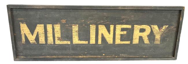 J44 Mid-19th century New England wooden Trade Sign advertising "Millinery". Letters are painted in gold on a black background. Single sided, one board surrounded with applied molding secured with small wire nails. Circa 1870�s. Measurements: 44 3/4" wide x 14 5/8" tall x 2 1/2" thick