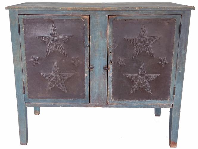 *SOLD* H258 Spectacular mid-19th century Shenandoah Valley Virginia Food Safe/ Pie Safe, in its original blue paint, and the original four over sized hand punched tins. The tins on the front have stars and on the sides the tin is punched in a circle pattern with stars in each corner. The doors are full mortise, the back has two wide boards with the original blue paint, The Pie safe rest on tall legs  