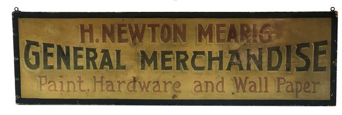 F51 19th century General Merchandise wooden trade sign advertising Paint Hardware and Wall Paper. H. Newton Mearig, proprietor from Lancaster County, Pennsylvania. Single board with yellow background with green and red letters and a green border. Measurements: 60" long x 17 1/2" tall x 2" thick