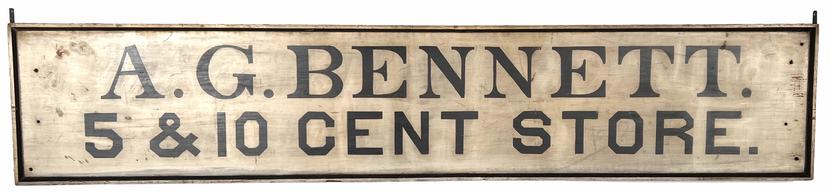 *SOLD* H70 Fantastic New England wooden trade sign advertising �A. G. BENNETT. 5 & 10 CENT STORE.� Original black lettering in white background. Sign is nicely framed with a 2 1/2� thick molding that boasts a black painted chamfered interior edge. Iron brackets on ends or holes in backboard for screws allow flexibility in hanging. Measurements: 90 1/4� wide x 2 1/2� thick x 17 3/4� tall 