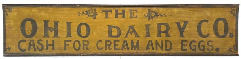 G33 Trade Sign wooden one sided beautiful mustard painted back ground with black lettering painted on one wide board with applied molding, for Ohio Dairy Co, cash for cream and Eggs. \