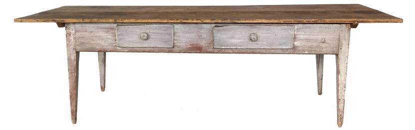 G703 Spectacular 18th century splay leg Pennsylvania two board scrub top table, in beautiful oyster white paint, with two dovetailed drawers. Circa 1790-1810. The drawers are two different sizes, with the left one being 14 3/4� wide and the right one being 20 3/8� wide. The top consists of two wide boards secured together with large butterfly (or �bow tie�) joints on the underside. Wooden pegs that are inserted through two battens underneath the top and extend into the base are what is used to secure the top to the base. Nice, sturdy tapered splayed legs that are mortised and pegged
