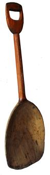 A218 19th century Single Piece Carved Wood Scoop Shovel with Original Chrome Orange Paint. Arched carved pan with cylindrical shaft and D-shaped carved handle. 35"l. x 12"w. 